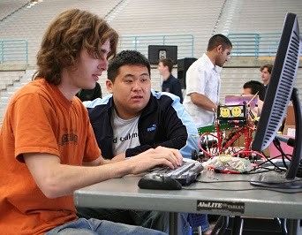 Students working on robot at Roborodentia